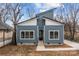 Charming blue home with modern architectural details and black framed windows at 913 Wilson W Lee Blvd, Statesville, NC 28677