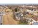 Aerial shot of a quiet neighborhood with a mix of old and new houses, showcasing the community's charm at 913 Wilson W Lee Blvd, Statesville, NC 28677
