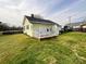A cozy house with a spacious backyard and a small porch at 101 Loya St, Mount Holly, NC 28120