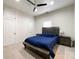 Spacious bedroom with a ceiling fan, neutral colored carpet and a dark wood bed at 101 Loya St, Mount Holly, NC 28120