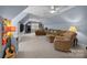 Spacious living room with large comfy couch, ceiling fans, carpet flooring and a tv at 102 Wyndham Way, Salisbury, NC 28147