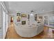 Spacious living room with a fireplace, hardwood floors and custom built-in bookshelves at 102 Wyndham Way, Salisbury, NC 28147