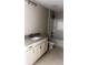 Well-lit bathroom featuring white cabinets and granite countertops at 11533 Valley Oaks Ln, Stanfield, NC 28163