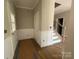 Welcoming entryway with wainscoting, stairs, and stylish details throughout at 11533 Valley Oaks Ln, Stanfield, NC 28163