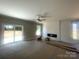 Spacious living room with fireplace and natural light at 11533 Valley Oaks Ln, Stanfield, NC 28163