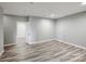 Finished basement featuring hardwood style flooring at 11609 Mersington Ln, Charlotte, NC 28277