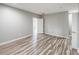 Bright bedroom with modern wood floor and neutral color palette at 11609 Mersington Ln, Charlotte, NC 28277