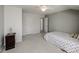 Bedroom featuring a ceiling fan, closet, and light gray carpet at 11609 Mersington Ln, Charlotte, NC 28277