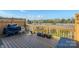 Inviting deck with wood railing and a grill, perfect for entertaining at 11609 Mersington Ln, Charlotte, NC 28277