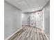 Finished basement hallway with wood-look flooring at 11609 Mersington Ln, Charlotte, NC 28277