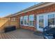 Relaxing deck featuring a grill with access from the house via glass doors at 11609 Mersington Ln, Charlotte, NC 28277