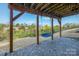 Cozy patio with a swing, offering a relaxing outdoor retreat at 11609 Mersington Ln, Charlotte, NC 28277