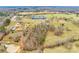 Wide aerial view of the property at 1221 Edgefield Rd, set amidst a landscape of trees and fields at 1221 Edgefield Rd, York, SC 29745