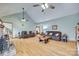 Open concept living room with hardwood floors, ample seating, and views of the fireplace at 1221 Edgefield Rd, York, SC 29745