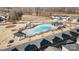 Aerial view showcases the community pool, playground, and nearby residences at 12425 Larue Ln, Huntersville, NC 28078