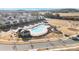 Aerial view of community pool, playground, and surrounding residential area at 12425 Larue Ln, Huntersville, NC 28078