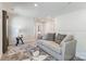 Loft area with neutral decor and comfortable sofa at 12425 Larue Ln, Huntersville, NC 28078