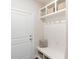 Mudroom with storage bench and hooks for coats and bags at 12425 Larue Ln, Huntersville, NC 28078