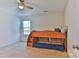 Bedroom featuring a wooden bunkbed, a window, carpeted flooring, and a ceiling fan at 137 Mossy Pond Rd, Statesville, NC 28677