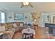 Bright living room with hardwood floors and comfortable seating at 137 Mossy Pond Rd, Statesville, NC 28677