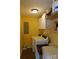 Well-lit laundry room with washer, dryer, and storage shelves at 14440 W Highway 55 Hwy, Blacksburg, SC 29702