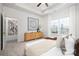 Bright bedroom features a neutral palette, large window, and modern furnishings at 1505 W May Ave, Gastonia, NC 28052
