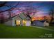 Charming single-Gathering home showcasing a well-maintained lawn and an inviting two-car garage at 1505 W May Ave, Gastonia, NC 28052