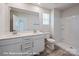 Bathroom features a double sink vanity with a large mirror and walk-in shower at 164 S Sycamore St, Mooresville, NC 28115