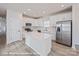 Open kitchen with stainless steel appliances and island at 164 S Sycamore St, Mooresville, NC 28115