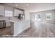 Spacious living room with kitchen and backyard view at 164 S Sycamore St, Mooresville, NC 28115