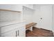 Well-organized mudroom features a built-in bench, coat hooks, and storage cabinets for added convenience at 1906 Maius Dr, Conover, NC 28613