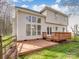 Exterior home view featuring a spacious backyard deck that's perfect for entertaining at 227 Tyndale Ct, Waxhaw, NC 28173