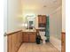 Bathroom featuring a shower and tub, toilet, vanity, mirror, and wood paneling at 2339 Perry Rd, Denver, NC 28037