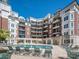 Resort-style apartments overlooking a pool and lounge area, offering luxury and leisure at 300 W 5Th W St # 407, Charlotte, NC 28202