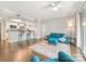 Cozy living room with hardwood floors, neutral paint, and a kitchen view at 300 W 5Th W St # 407, Charlotte, NC 28202