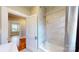 Beautifully remodeled bathroom with tiled shower, new fixtures, and natural light at 317 Kings Mountain St, York, SC 29745