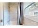 Beautifully remodeled bathroom with tiled shower, new fixtures, and natural light at 317 Kings Mountain St, York, SC 29745