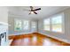 Bright and airy living room with hardwood floors, fireplace, and lots of natural light at 317 Kings Mountain St, York, SC 29745