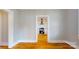 Bright living room with hardwood floors and a doorway view of the adjacent kitchen at 317 Kings Mountain St, York, SC 29745