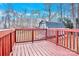 Wooden deck offering an outdoor space overlooking backyard with shed and trees at 340 Vernon Ln, Statesville, NC 28677