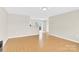 Bright and airy living room with laminate flooring, neutral walls, and ample natural light at 340 Vernon Ln, Statesville, NC 28677