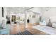 Bright, open living space featuring modern hardwood floors and abundant natural light at 4034 Sagemont Nw Dr, Concord, NC 28027
