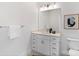 Bright bathroom featuring a modern sink, toilet, and a large mirror with modern light fixtures at 5007 Nimes Rd # 28, Charlotte, NC 28208