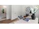 Bright office featuring a modern desk, chair, and views into the bathroom at 5007 Nimes Rd # 28, Charlotte, NC 28208