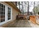 Wooden deck offering outdoor seating and views of the property's lush surroundings at 5060 Post Oak Ln, Rock Hill, SC 29732