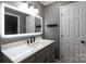 Bathroom with granite countertop, modern rectangular lighted mirror, and new fixtures at 5060 Post Oak Ln, Rock Hill, SC 29732