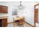 Bright dining area with tile flooring, wooden table and chairs, and a modern light fixture at 5060 Post Oak Ln, Rock Hill, SC 29732