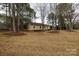 Charming single story home featuring a well-maintained front lawn and mature trees at 5060 Post Oak Ln, Rock Hill, SC 29732