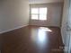 Inviting living room with natural light and hardwood floors at 6354 Old Pineville Rd # A, Charlotte, NC 28217