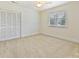 Bright bedroom with a large closet, window, and neutral carpeting, perfect for relaxation at 7811 Biddstone Ct, Charlotte, NC 28226